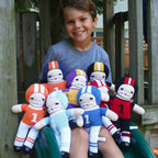 Petit Ami & Zubels - Football Player Knit Dolls: Red/White / 7" Rattle
